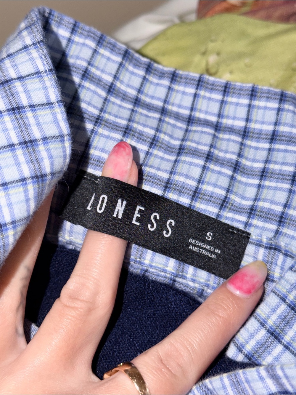 Lioness Racquet Club Knit Polo in Navy with Gingham Collar Detail - Picture 7 of 7